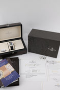 Bild in Galerie-Betrachter laden, Patek Philippe Complications 5231G-001 - Papiere und oder Lieferumfang
