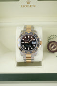 Bild in Galerie-Betrachter laden, Rolex GMT-Master II 116713LN - Detail view 1
